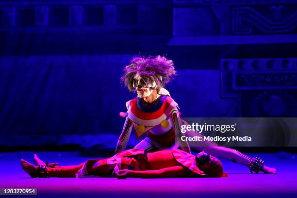 Artists perform on stage during the presentation of the show '¿Y a Dónde Irán los Muertos?' at Teatro de la Ciudad on October 31, 2020 in Mexico...