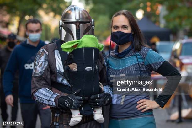 Family dressed as Disney Plus' The Mandalorian poses in the East Village on October 31, 2020 in New York City. Many Halloween events have been...