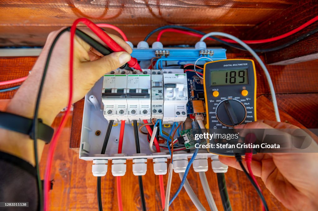Electrician measurements with multimeter tester System ready