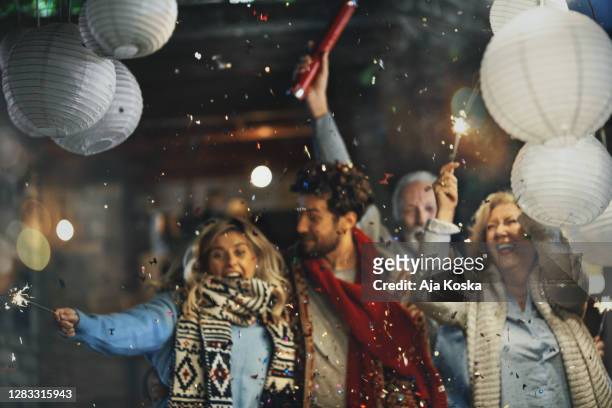 family new year party. - family new year's eve stock pictures, royalty-free photos & images