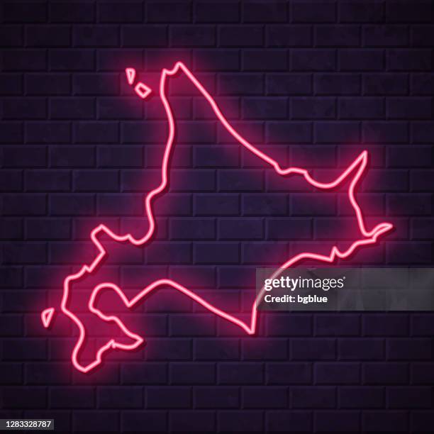 hokkaido map - glowing neon sign on brick wall background - japan billboard stock illustrations