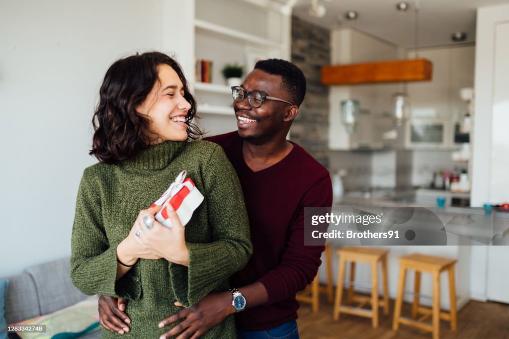 Interracial young couple celebrating Valentine's day