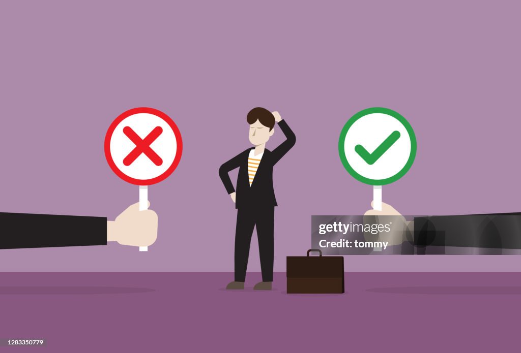 Businessman chooses between the right or wrong sign