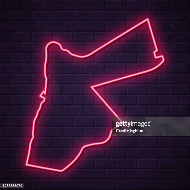jordan map - glowing neon sign on brick wall background - led light wall stock illustrations