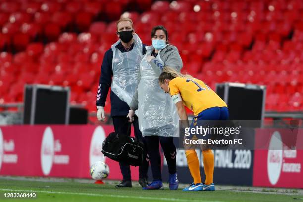 Lucy Graham of Everton receives medical attention during the Vitality Women's FA Cup Final match between Everton Women and Manchester City Women at...
