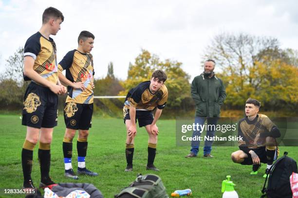 Players look on at half time during Sunday league football match between Linchfield Lions and Boldmere Wanderers on November 01, 2020 in Lichfield,...