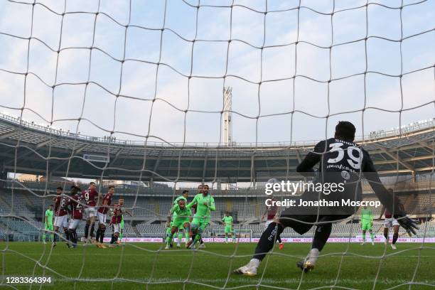 Sergej Milinkovic-Savic of SS Lazio fires the ball past Salvatore Sirigu of Torino FC from a free kick to level the scoreline at 2-2 during the Serie...