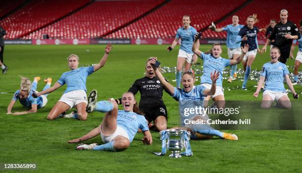 Manchester City players celebrate with the Vitality Women's FA Cup Trophy following their team's victory in the Vitality Women's FA Cup Final match...