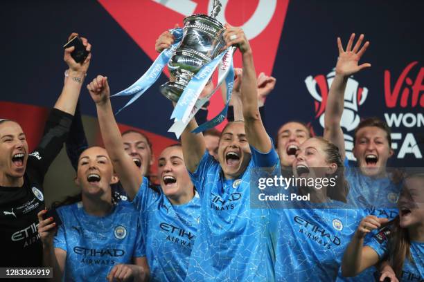 Steph Houghton, Captain of Manchester City lifts the Vitality Women's FA Cup Trophy following her team's victory in the Vitality Women's FA Cup Final...