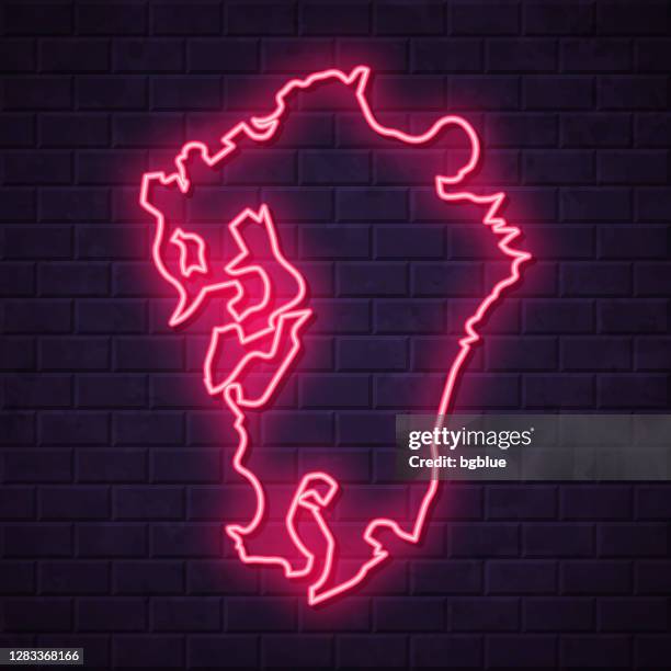 kyushu map - glowing neon sign on brick wall background - japan billboard stock illustrations