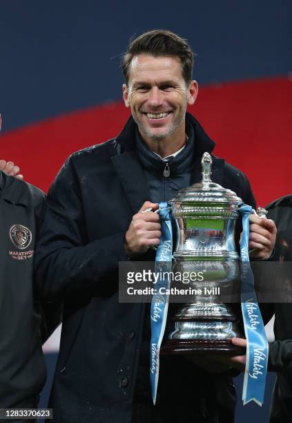 Gareth Taylor, Manager of Manchester City celebrates with the Vitality Women's FA Cup Trophy following his team's victory in the Vitality Women's FA...