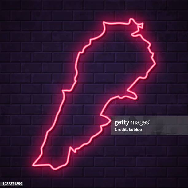 lebanon map - glowing neon sign on brick wall background - beirut stock illustrations