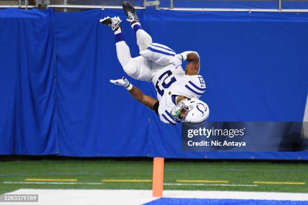 Nyheim Hines of the Indianapolis Colts celebrates after scoring a touchdown on a 22-yard reception against the Detroit Lions during the second...