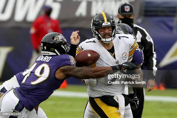 Linebacker Chris Board of the Baltimore Ravens knocks the ball out of the hands of quarterback Ben Roethlisberger of the Pittsburgh Steelers in the...