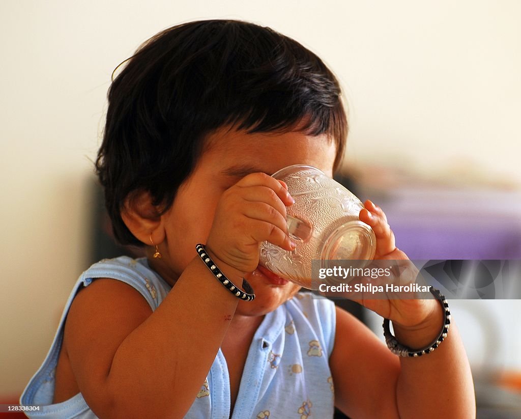 Child drinking from cup