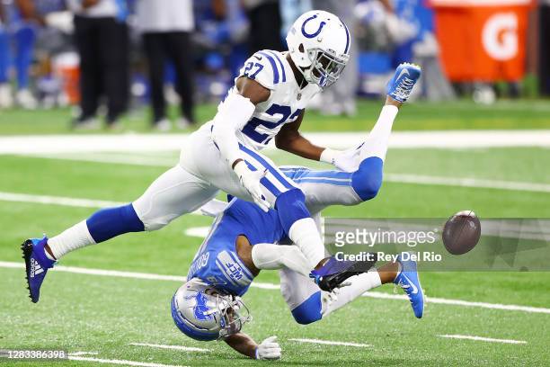 Xavier Rhodes of the Indianapolis Colts breaks up a pass intended for Kenny Golladay of the Detroit Lions during the first quarter at Ford Field on...