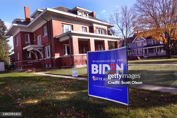 Campaign sign supporting Democratic presidential nominee Joe Biden and his running mate Sen. Kamala Harris sits in the front yard of a home on...