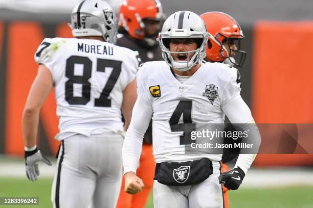 Quarterback Derek Carr of the Las Vegas Raiders celebrates a first down rush against the Cleveland Browns during the second half of the NFL game at...