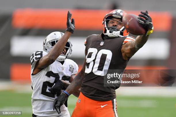 Wide receiver Jarvis Landry of the Cleveland Browns catches a 25-yard reception past free safety Lamarcus Joyner of the Las Vegas Raiders during the...