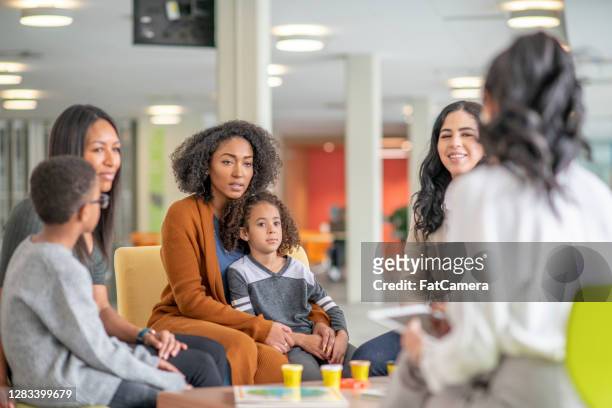family support group - person of colour stock pictures, royalty-free photos & images