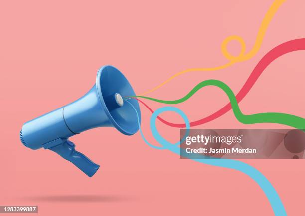 speaker with colourful sound waved ribbons - advertising concept photos et images de collection