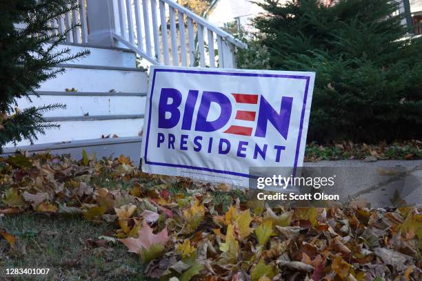 Campaign sign supporting Democratic presidential nominee Joe Biden sits in the front yard of a home on November 01, 2020 in Racine, Wisconsin. Today...