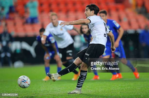 Carlos Soler of Valencia scores his sides second goal from the penalty spot during the La Liga Santander match between Valencia CF and Getafe CF at...