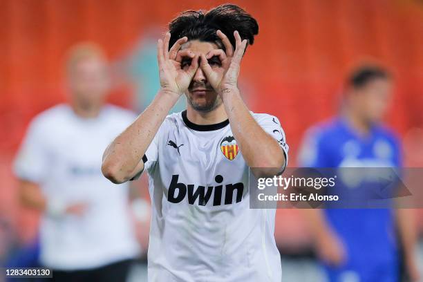 Carlos Soler of Valencia CF celebrates scoring his side's 2nd goal in the 95th minute during the La Liga Santander match between Valencia CF and...