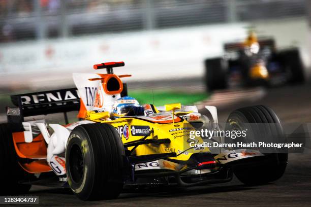 Spanish Renault Formula One driver Fernando Alonso driving his Renualt R28 racing car during the 2008 Singapore Grand Prix at the Marina Bay Street...