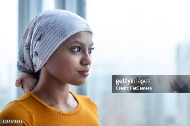 portrait of beautiful young woman with cancer - leukemia stock pictures, royalty-free photos & images