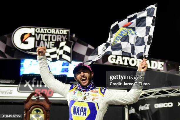 Chase Elliott, driver of the NAPA Auto Parts Chevrolet, celebrates in victory lane after winning the NASCAR Cup Series Xfinity 500 at Martinsville...