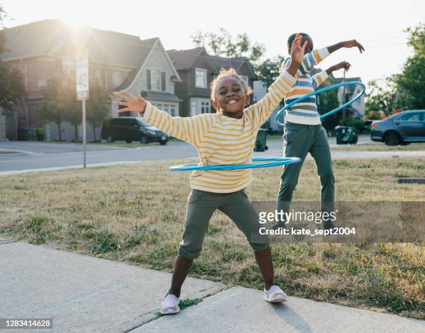 joy and happiness  being outdoor with friends and siblings - playful stock pictures, royalty-free photos & images