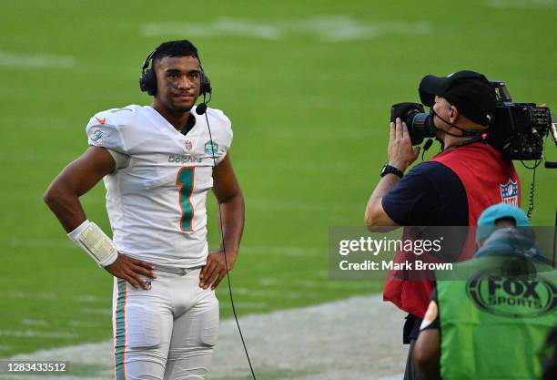 Tua Tagovailoa of the Miami Dolphins conducts an interview after the game against the Los Angeles Rams at Hard Rock Stadium on November 01, 2020 in...