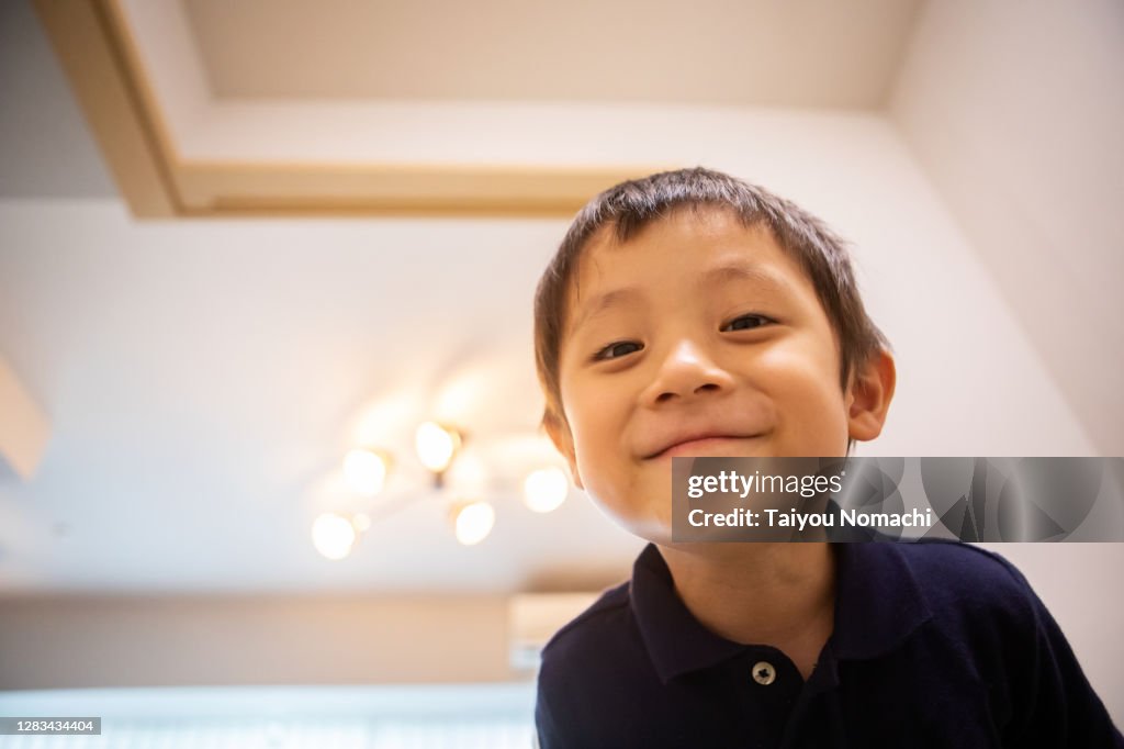 A boy looking into the camera