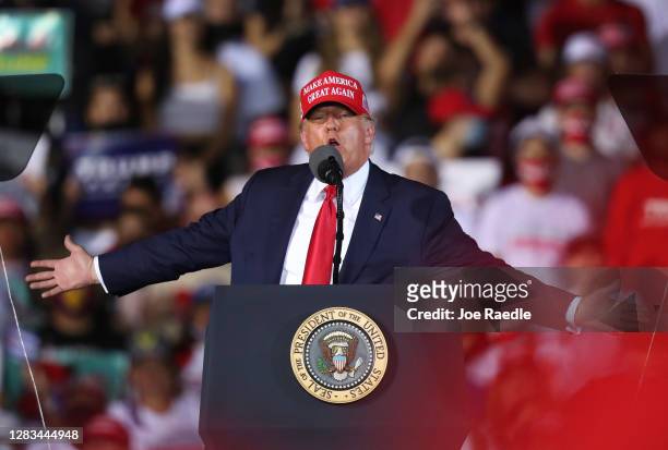 President Donald Trump speaks during his campaign event at Miami-Opa Locka Executive Airport on November 1, 2020 in Opa Locka, Florida. President...