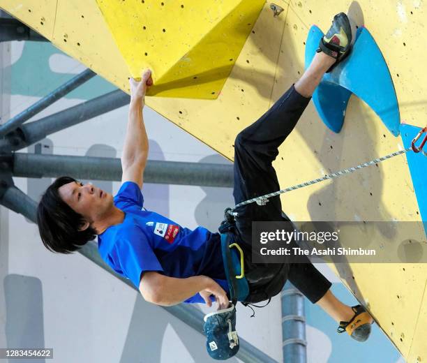 Tomoaki Takata competes in the Men's Lead on day two of the Sports Climbing Top of the Top 2020 at the Ishizuchi Climbing Park Saijo on November 1,...
