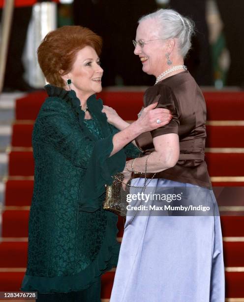 Lady Elizabeth Shakerley greets Queen Margrethe II of Denmark as they attend a pre-wedding gala dinner on the eve of the Royal Wedding of Prince...