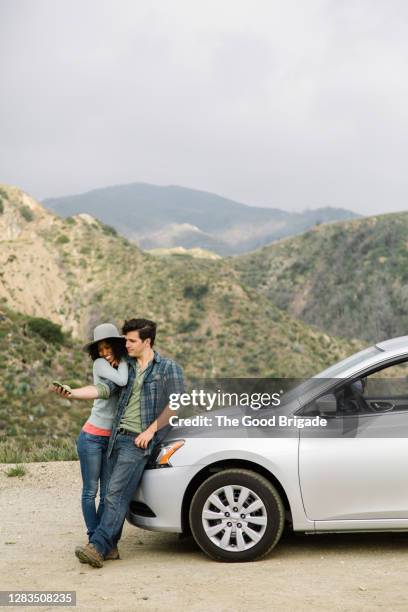 couple taking selfie on scenic road - arcadia califórnia imagens e fotografias de stock