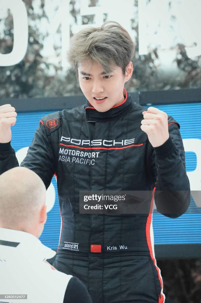 Singer Kris Wu Yifan stands on the podium after 2020 Porsche Sports News  Photo - Getty Images
