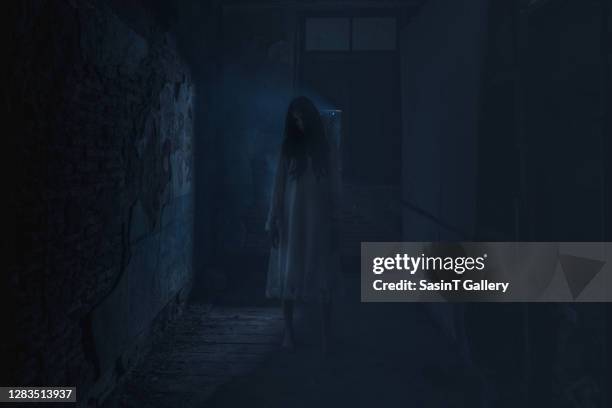 scary ghost woman in haunted house - enchanted film stock pictures, royalty-free photos & images