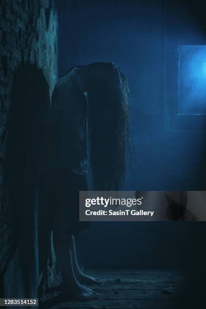 horror style scene, alone girl in creepy house - zombie girl ストックフォトと画像