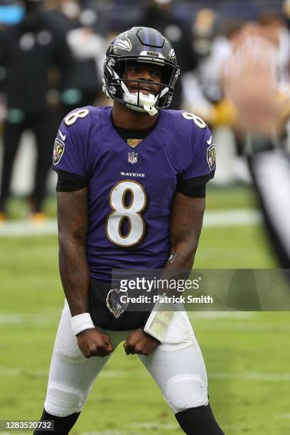 Quarterback Lamar Jackson of the Baltimore Ravens celebrates a touchdown against the Pittsburgh Steelers at M&T Bank Stadium on November 01, 2020 in...