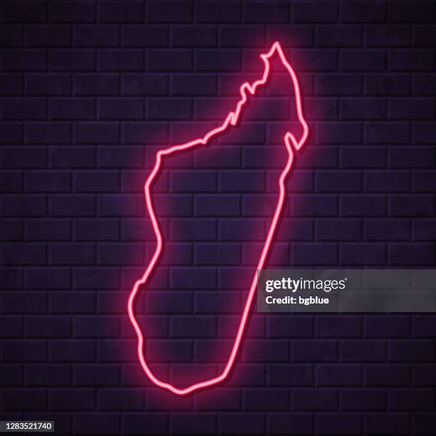 madagascar map - glowing neon sign on brick wall background - antananarivo stock illustrations