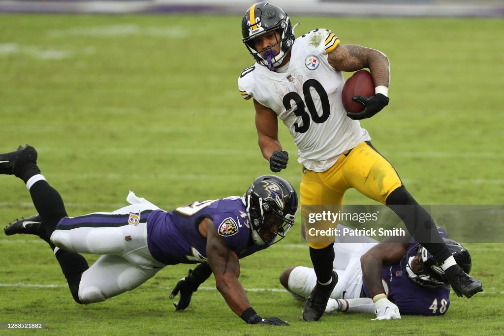James Conner Rushing Running back James Conner of the Pittsburgh Steelers rushes past ...