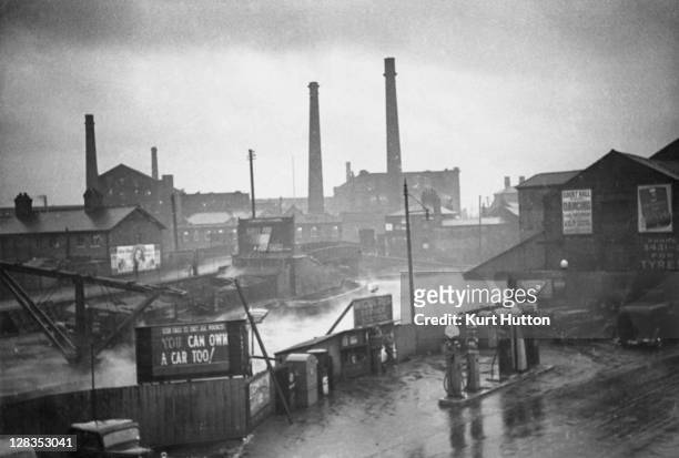 The Wigan Pier service station next to the canal in Wigan, Greater Manchester, UK, 1939. Original Publication : Picture Post - 228 - Wigan - pub....