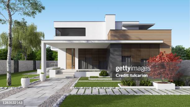 luxurious beautiful modern villa with front yard garden - facade imagens e fotografias de stock