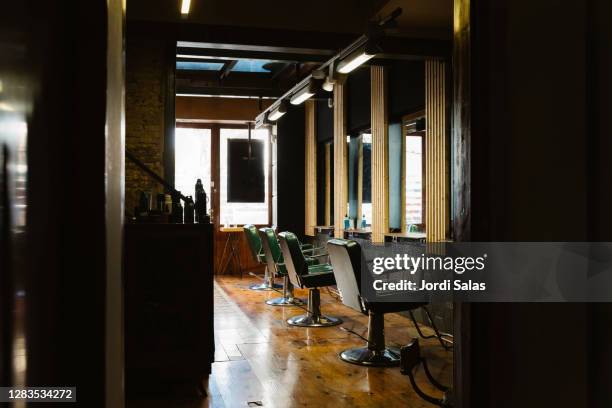 interior of a hairdresser shop - barbers stockfoto's en -beelden