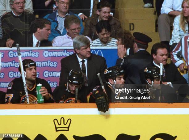 Head coach Pat Quinn of the Vancouver Canucks watches the play against the Toronto Maple Leafs during 1993-1994 NHL playoff game action at Maple Leaf...
