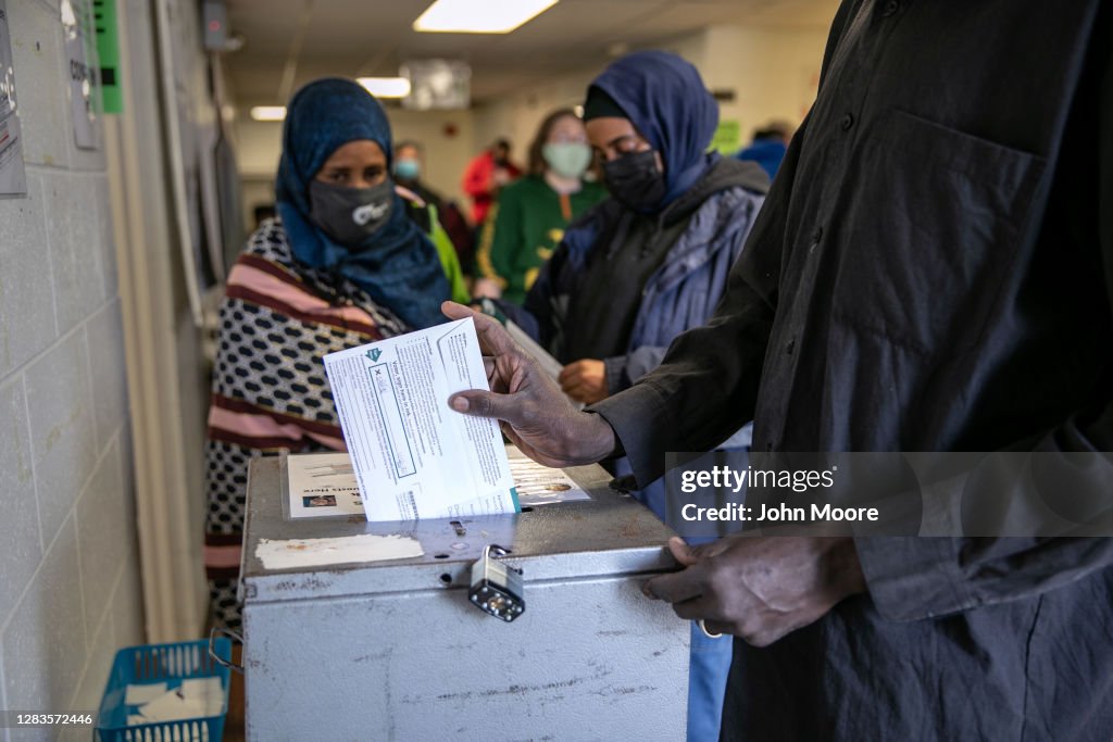 Michigan Voters Line Up At The Polls On The Last Day Of Early Voting