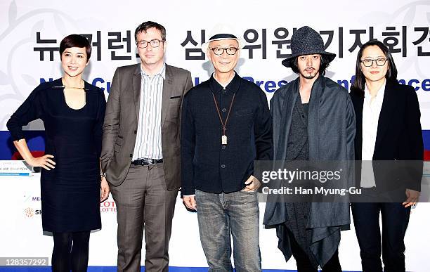 New Currents Jury Members of Jiang Wenli,Olivier Pere,Yonfan,Odagiri Joe and Oh Jung-Wan attend new currents jury members press conference during the...